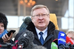 FILE - Vladimir Zherebenkov, the lawyer of Paul Whelan, a former U.S. Marine accused of espionage and arrested in Russia, speaks with the media outside the court building in Moscow, Jan. 22, 2019.
