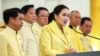 Thai Prime Minister Paetongtarn Shinawatra, backed by members of her Cabinet, speaks during a press conference in Bangkok, Thailand, on Sept. 7, 2024.