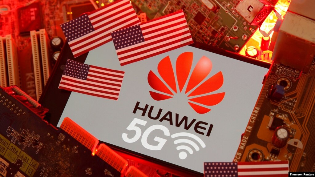 图为美国国旗及华为和5G标识。（资料图片）