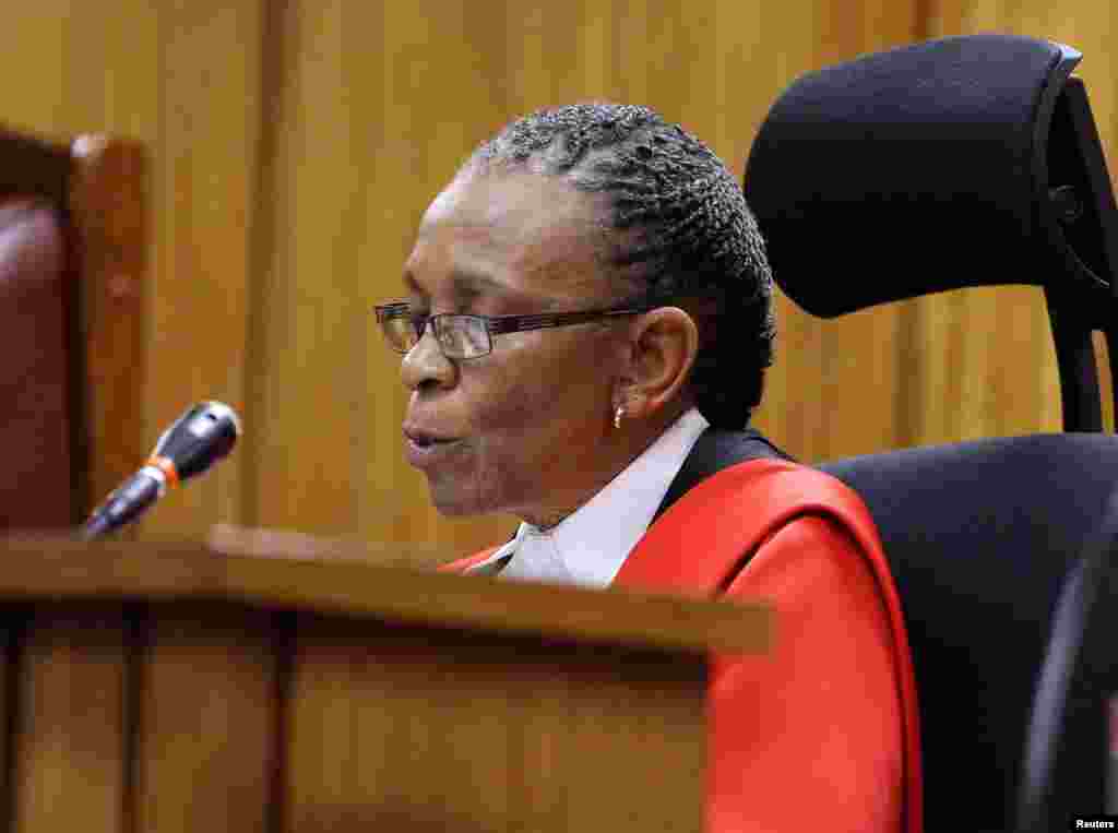 Judge Thokozile Masipa reads her verdict in the Oscar Pistorius trial at the North Gauteng High Court in Pretoria, Sept. 11, 2014.&nbsp;
