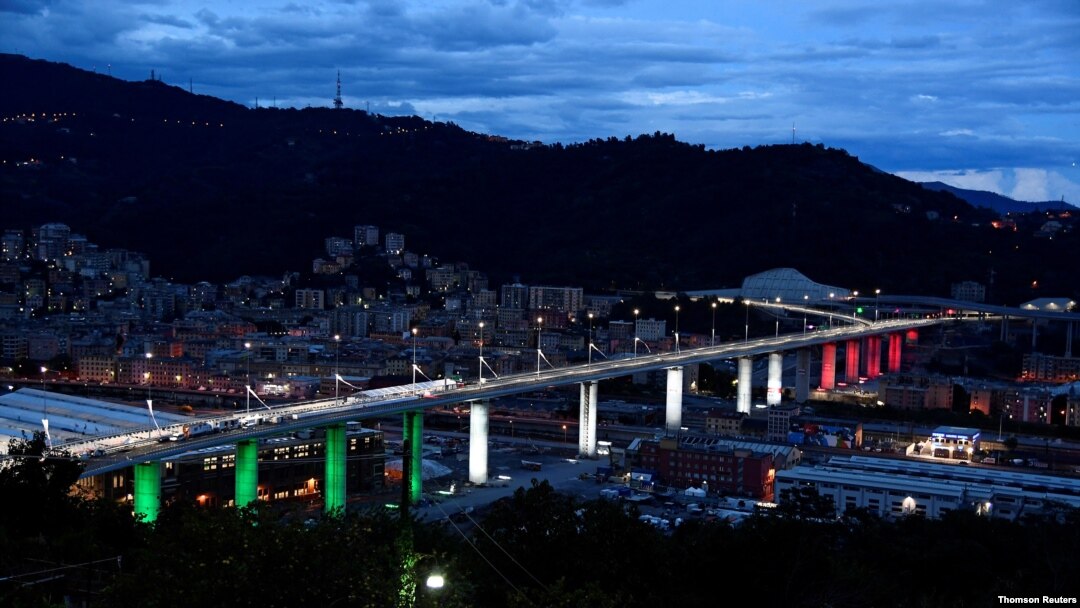 The new bridge in Genoa, Italy, is illuminated in the colors of the Italian flag during its official inauguration, August 3, 2020, after it was rebuilt following its collapse August 14, 2018, which killed 43 people. 