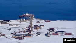 The town of Ny-Aalesund in Norway's high Arctic as seen from the top of the nearby Zeppelin mountain, May 28, 2013. 