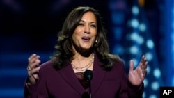 FILE - Democratic Vice Presidential candidate Senator Kamala Harris speaks at the Democratic National Convention. 