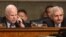 Senate Armed Services Committee Chairman John McCain, R-Ariz., left, accompanied by the committee's ranking member, Sen. Jack Reed, D-R.I., speaks during a committee meeting on Islamic State, on Capitol Hill in Washington, Oct. 27, 2015. 