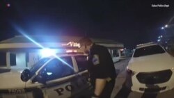 Угон полицейской машины в наручниках