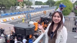 赛车驶入华盛顿街头 特朗普观赛 20万民众共庆美国250周年 