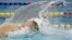 FILE - China's Sun Yang swims in his men's 200m freestyle heat at the 17th Asian Games in Incheon, South Korea, Sept. 21, 2014. Olympic and world champion swimmer Sun served a three-month ban after testing positive for a banned stimulant.
