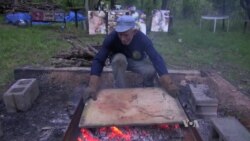 Fire Painting Artist Burns His Art