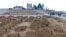 Mourners preparing to bury the remains of a person who died from complications related to COVID-19 at the Sarajevo cemetery Vlakovo, Bosnia, Friday, March 19, 2021. 