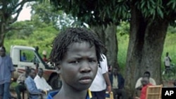 A rebel Lord's Resistance Army boy soldier stands at the Sudan/DRC border (File)