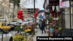 Weakened consumer budgets and pandemic lockdown have dampened the mood for this year’s Valentine’s Day celebrations, in Baku, Azerbaijan, Feb. 14, 2022.