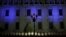 FILE - Police officers stand guard during a protest in support of the head of the Special Prosecutor's Office Against Impunity (FECI), who was removed from office by Guatemala's Attorney General, in front of the National Palace in Guatemala City, Guatemala, July 24, 2021.