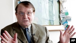 FILE - French scientist Luc Montagnier speaks during an interview on June 5, 2006, in Paris. Montagnier, who won the Nobel Prize in 2008 for discovering HIV and had more recently spread false claims about the coronavirus, died Feb. 10, 2022, at age 89.