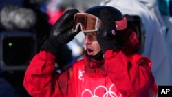 Canada's Mark McMorris reacts to score following his second run in the men's slopestyle final at the Olympic Games in Beijing, Feb. 7, 2022.