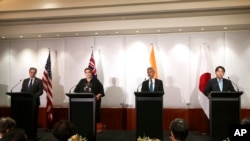 FILE - From left: U.S. Secretary of State Antony Blinken, Australia's Minister for Foreign Affairs Marise Payne, India's Minister of External Affairs S. Jaishankar, and Foreign Minister of Japan Yoshimasa Hayashi participate in the Quad foreign ministers' press conference in Melbourne, Feb. 11, 2022.