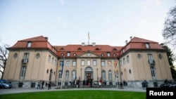 FILE - Villa Borsig, the official guest house of the foreign ministry, is pictured during a meeting of foreign ministers to examine the implementation of the Minsk peace accords agreed in February to end the fighting in eastern Ukraine, in Berlin, April 13, 2015.