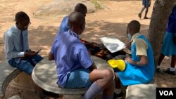 FILE: Students studying on their own after schools shutdown due to a crippling civil service strike in 2021. (Columbus Mavhunga/VOA) 