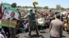 Zimbabwe's ruling ZANU-PF supporters at a rally on Feb. 12, 2022 in Epworth about 40 minutes south east of Harare. (Columbus Mavhunga/VOA)