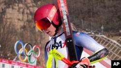 Mikaela Shiffrin of the United States walks from the finish area after a training run at the 2022 Winter Olympics, Feb. 10, 2022, in the Yanqing district of Beijing.