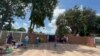 Some learners leave school in Chitungwiza, Zimbabwe, Feb. 10, 2022, when they discovered that teachers had not changed their minds about their strike after the government offered them a pay raise and incentives. (Columbus Mavhunga/VOA) 