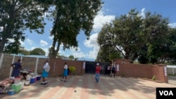 Some learners leave school in Chitungwiza, Zimbabwe, Feb. 10, 2022, when they discovered that teachers had not changed their minds about their strike after the government offered them a pay raise and incentives. (Columbus Mavhunga/VOA) 