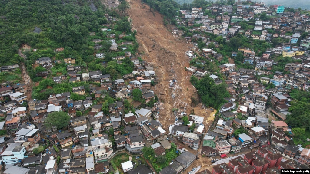 An aerial view shows a neighborhood affected by landslides in Petropolis, Brazil, Wednesday, Feb. 16, 2022.