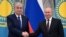 Президент Казахстана Касым-Жомарт Токаев и его российский коллега Владимир Путин