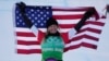 United States’ Lindsey Jacobellis celebrates after winning a gold medal in the women’s cross finals at the 2022 Winter Olympics, Wednesday, Feb. 9, 2022, in Zhangjiakou, China. (AP Photo/Lee Jin-man)