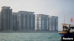 恒大集团在中国海南省一个人工岛屿海花岛上建造的39座高层住宅楼将被摧毁。（2022年1月7日）