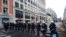 Police officers form a line as they prepare to confront protestors during a demonstration regarding COVID-19 restrictions in Brussels, Feb. 14, 2022.