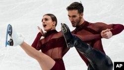 Ice dancers Gabriella Papadaki and Guillaume Cizeron of France perform during the 2022 Winter Olympics in Beijing, Feb. 12, 2022.