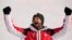 Johannes Strolz, of Austria, gold, celebrates during the medal ceremony for the the men's combined, Feb. 10, 2022.
