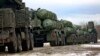 Russia Starts Military Drills in Belarus, Docks Ships at Crimean Port