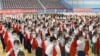 This Feb. 11, 2022, photo from North Korea's official Korean Central News Agency (KCNA) shows the Korean Children's Union of the Central Committee of the Socialist Patriotic Youth League performing to mark the 80th birthday of former leader Kim Jong Il in Pyongyang.