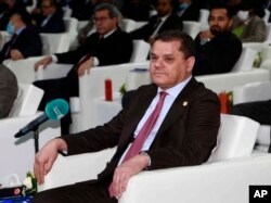 Prime Minister Abdul Hamid Dbeibah attends an inauguration ceremony for the completion of a road implementation project, in Tripoli, Libya, Jan. 31, 2022.