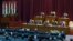 FILE - Libyan parliament meets to discuss approving new government, in Sirte, March 8, 2021.