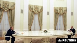 Владимир Путин и Олаф Шольц на встрече в Кремле, архив