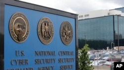 This file photo shows the sign outside the National Security Administration (NSA) campus where U.S. Cyber Command is located in Fort Meade, Md., June 6, 2013. (AP Photo/Patrick Semansky, File)