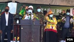 President Emmerson Mnangagwa and his wife at an election campaign rally in Epworth, Zimbabwe