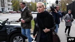 FILE - Yulia Navalnaya, leaves Moscow's Babushkinsky district court after a hearing to consider an appeal by Navalny against a defamation sentence imposed in February for insulting a World War II veteran, on Apr. 29, 2021.