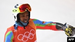 FILE - Eritrea's Shannon Abeda reacts after competing in the Men's Giant Slalom at the Jeongseon Alpine Center during the Pyeongchang 2018 Winter Olympic Games in Pyeongchang, South Korea, Feb. 18, 2018.