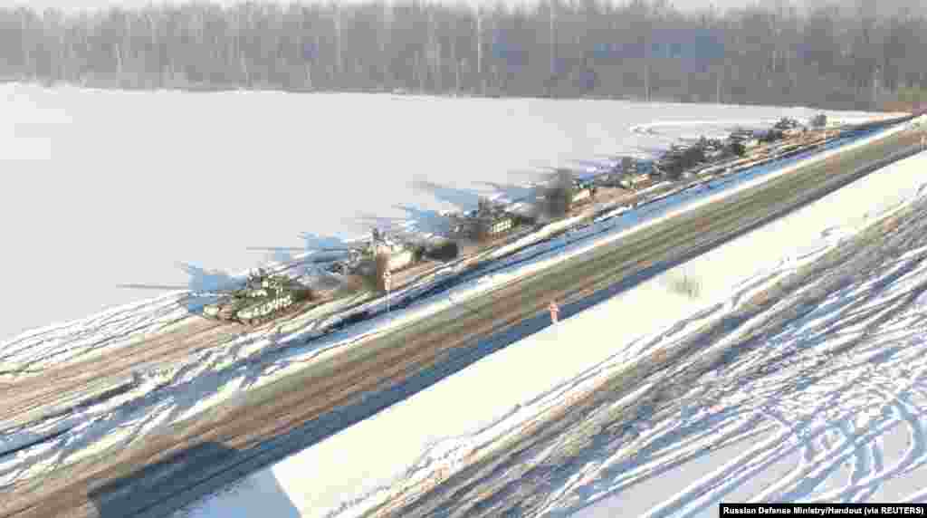 Russian tanks of the Western Military District units return to their permanent deployment sites, in an unknown location in Russia, in this still image taken from a handout video.