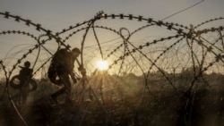 In this photo provided by Ukraine's 24th Mechanised Brigade press service, servicemen of the 24th Mechanised Brigade install anti-tank landmines and non explosive obstacles along the front line near Chasiv Yar town in Donetsk region, Ukraine, Wednesday Oct. 30, 2024. (Oleg Petrasiuk/Ukrainian 24th Mechanised Brigade via AP)