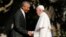 U.S. President Barack Obama, left, greets Pope Francis upon his arrival at the White House in Washington, Sept. 23, 2015. 