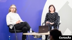 Peter Geoghegan, from openDemocracy, and Susan Coughtrie of the Foreign Policy Centre are pictured at this week's Anti-SLAPP conference in London. (Justice for Journalists Foundation/Foreign Policy Centre)