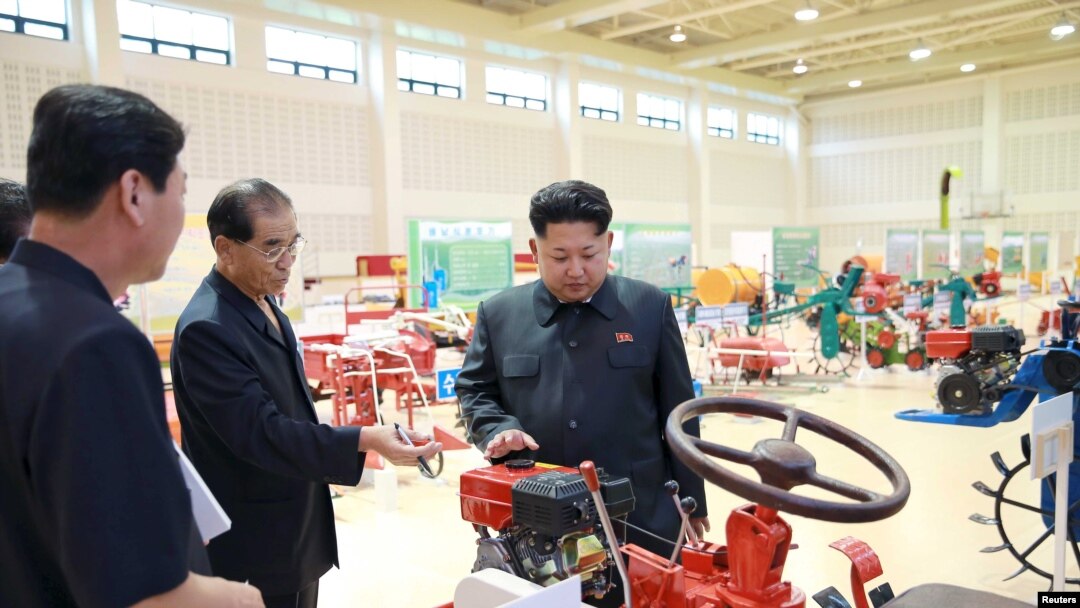 North Korean leader Kim Jong Un visits a farm machine exhibition in this undated photo released by North Korea's Korean Central News Agency (KCNA) in Pyongyang, Aug. 6, 2015. 