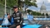 Aug 23, 2026; Washington, D.C., USA; Andretti Global driver Kyle Kirkwood (27) celebrates with the winner's trophy after the Freedom 250 Grand Prix of Washington, D.C. on the street circuit at National Mall. 