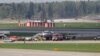 Members of emergency services and investigators work at the scene of an incident involving an Aeroflot Sukhoi Superjet 100 passenger plane at Moscow's Sheremetyevo airport, Russia May 6, 2019. 