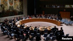 The United Nations Security Council votes on resolution on humanitarian aid for Syria at U.N. headquarters in New York, Feb. 22, 2014. 