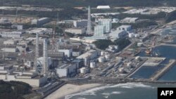 TOPSHOT - Pembangkit Listrik Tenaga Nuklir Fukushima Daiichi TEPCO yang lumpuh di Okuma, prefektur Fukushima, 24 Agustus 2023. (JIJI PRESS / AFP) 